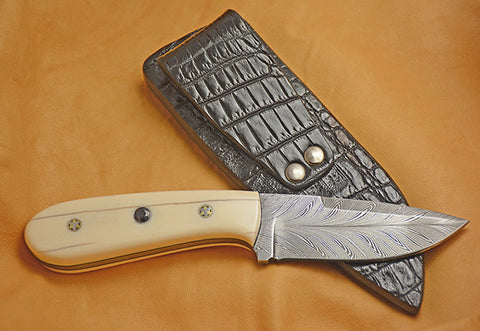 Oz Knives 4 inch Damascus Drop Point with Fossil Walrus Handle and Inlaid Blue Sapphires.