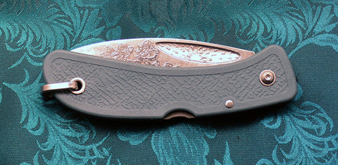 Boye Sunburst Lockback Folding Pocket Knife with 'Orchid' Etching and Blue Handle.