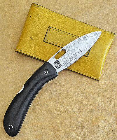 Boye Custom Open Hole Lockback Folding Knife with 'All Over Cannabis Leaf Pattern' Etchings.