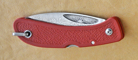 Boye Sunburst Lockback Folding Pocket Knife with 'Sunflowers' Etching and Red Zytel Handle.