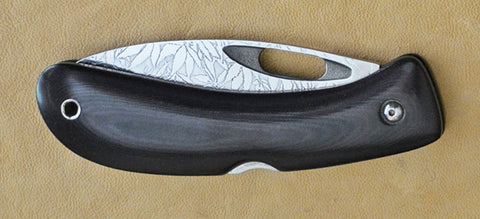 Boye Custom Open Hole Lockback Folding Knife with 'All Over Cannabis Leaf Pattern' Etchings.