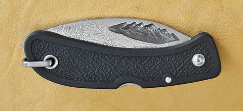 Mountains Lockback Folding Pocket Knife with 'Wapiti Elk' Etching and Black Zytel Handle.