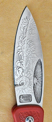 Boye Sunburst Lockback Folding Pocket Knife with 'Sunflowers' Etching and Red Zytel Handle.