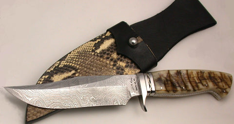 Todd Kopp 5.25 inch Damascus Hunter.