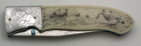 3.75 inch Locking Liner Folder by Don Maxwell with 'Sea Otters' Etchings and Bob Hergert Scrim.