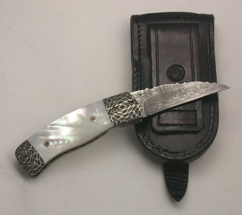 2.25 inch Damascus 'Bird's Beak' Locking Liner Folder by Don Norris.