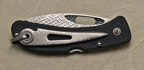 Boye Basketweave/Open Thumb Hole Lockback Folding Pocket Knife with 'Basketweave' Etching.