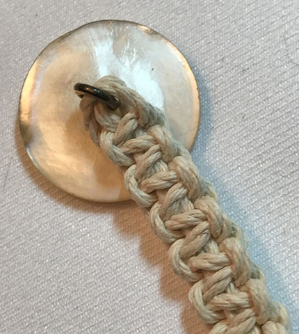 Natural Waxed Hemp Macrame Lanyard with Antique Mother of Pearl Carved Wheel Design Button.