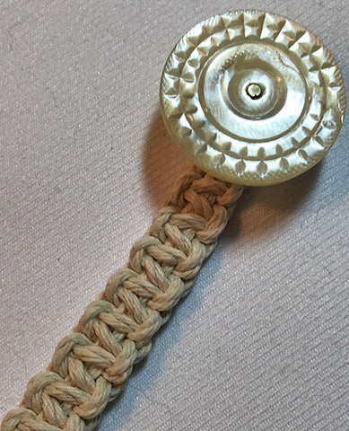 Natural Waxed Hemp Macrame Lanyard with Antique Mother of Pearl Carved Wheel Design Button.
