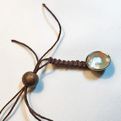Brown Waxed Hemp Macrame Lanyard with Antique Mother of Pearl and Brass Button.