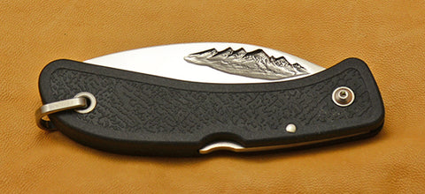 Boye Cobalt Mountain Lockback Folding Pocket Knife with Black Zytel Handle.