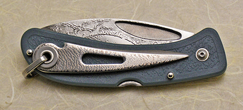 Boye Prophet Lockback Folding Pocket Knife with "Trout" Etching and Blue Zytel Handle with Marlin Spike.