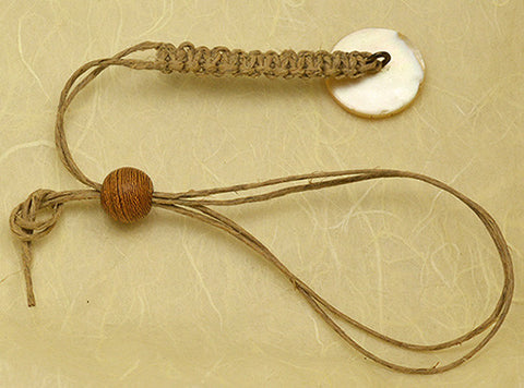 Natural Waxed Hemp Macrame Lanyard with Antique Mother of Pearl Carved Wheel Design Button.