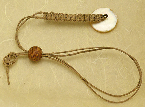 Natural Waxed Hemp Macrame Lanyard with Antique Mother of Pearl Carved Wheel Design Button.