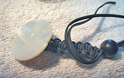 Black Leather Lace Macrame Lanyard with White Carved Mother of Pearl.