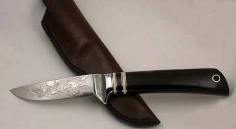 4 inch Dropped Point Hunter with 'Eagles' Etching.