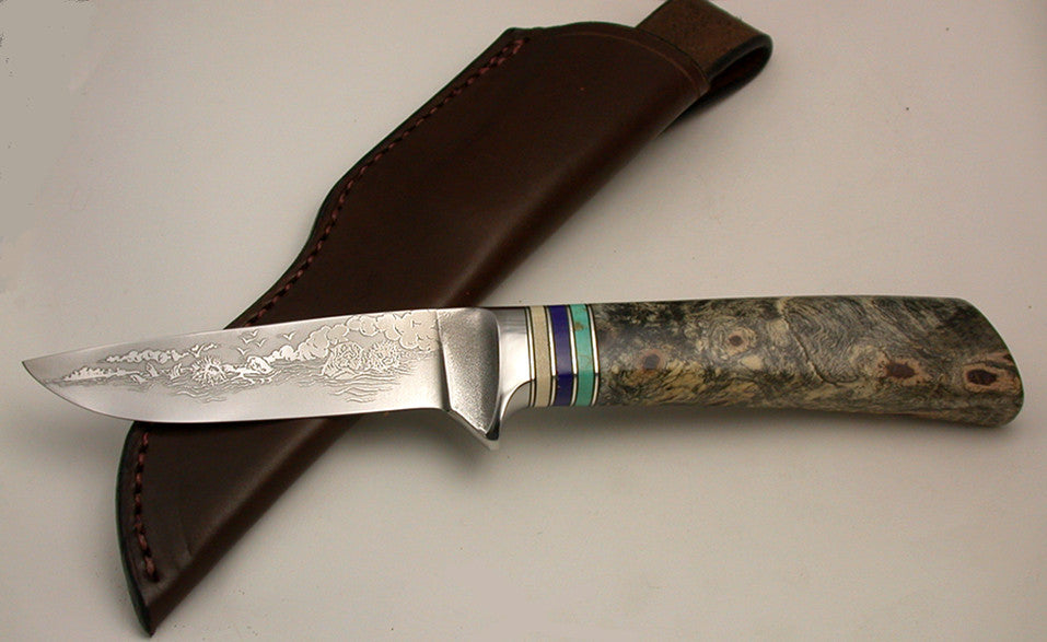 4 inch Dropped Point Hunter with 'Sea Otters' Etching.