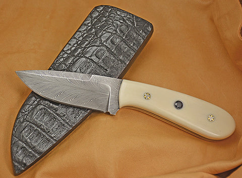 Oz Knives 4 inch Damascus Drop Point with Fossil Walrus Handle and Inlaid Blue Sapphires.