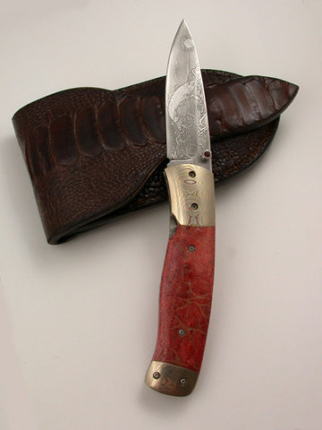 Don Norris 3 inch Damascus Locking Liner Folder with 'Salmon' Etching.