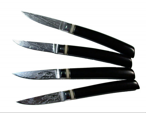 4 Piece Steak Set with 'Tsunami' and '3-Stalk Bamboo' Etchings.