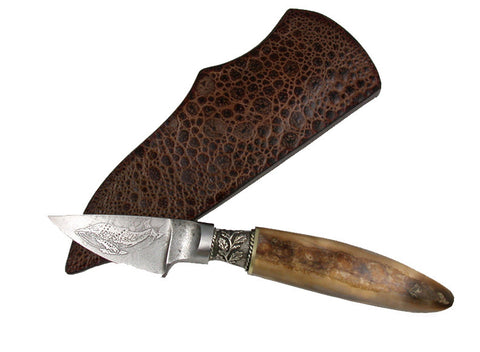 2 inch Dropped Edge Utility Knife with 'Humpback Whale' Etching and Fossil Walrus Handle.